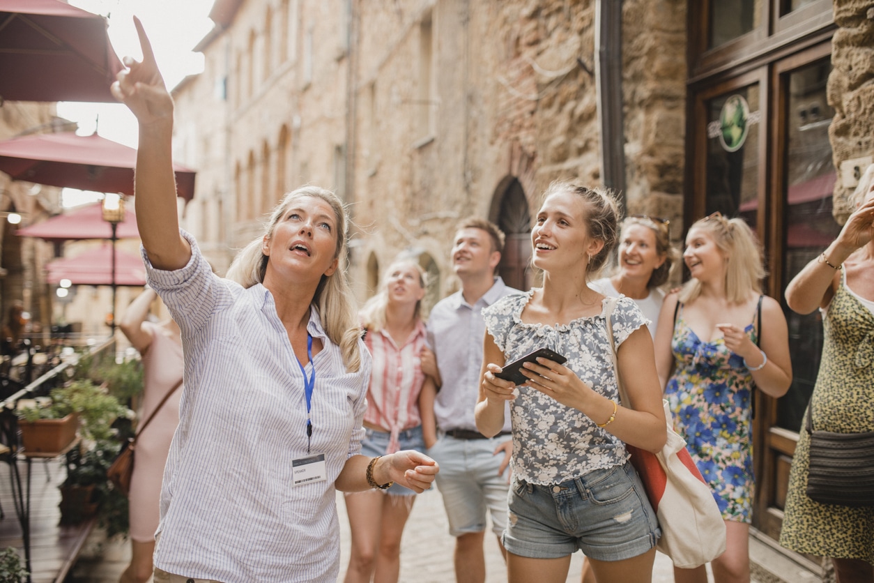 Group of travelers on a guided tour.